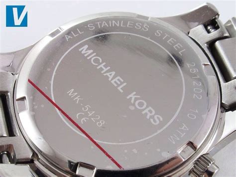 how to open michael kors watch.